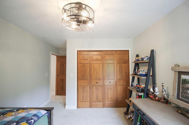 10551 Shore Dr, Merrifield, MN 56465 - bedroom with carpet flooring, a closet, baseboards, and a chandelier