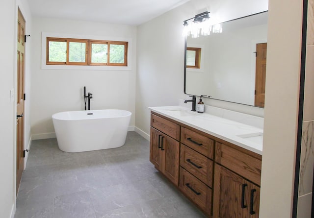 10551 Shore Dr, Merrifield, MN 56465 - bathroom with double vanity and a freestanding bath