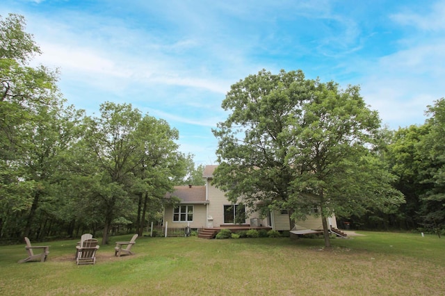10551 Shore Dr, Merrifield, MN 56465 - view of grassy yard featuring a deck