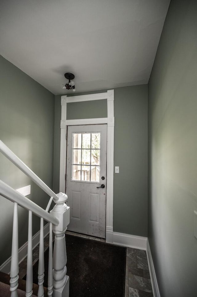 711 2nd St W, Northfield, MN 55057 - doorway with baseboards and stairs