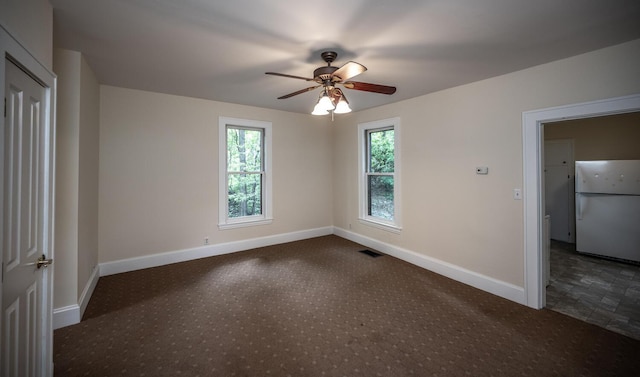 711 2nd St W, Northfield, MN 55057 - spare room with baseboards and a ceiling fan