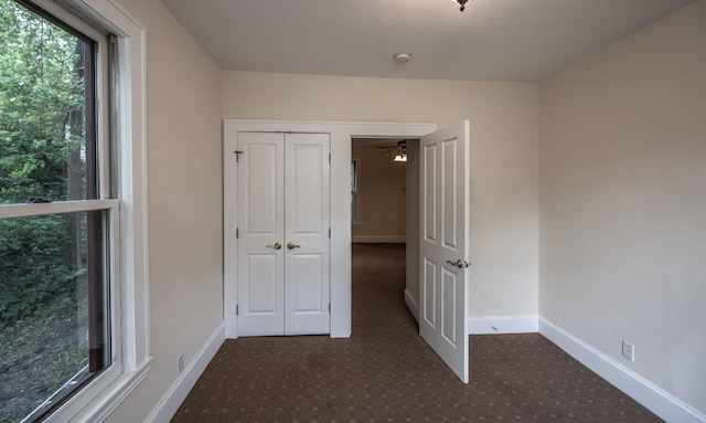 711 2nd St W, Northfield, MN 55057 - unfurnished bedroom with baseboards and a closet