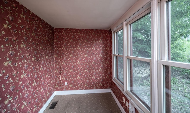 711 2nd St W, Northfield, MN 55057 - spare room featuring baseboards and wallpapered walls