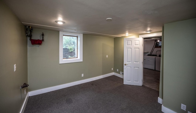 711 2nd St W, Northfield, MN 55057 - basement with baseboards, dark carpet, and independent washer and dryer