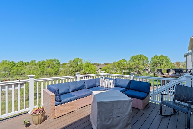 deck with an outdoor living space
