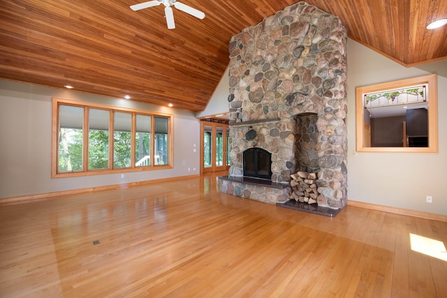 4214 Fairview Ln, Jamestown Twp, MN 56063 - unfurnished living room with wood ceiling, hardwood / wood-style flooring, baseboards, a ceiling fan, and a fireplace