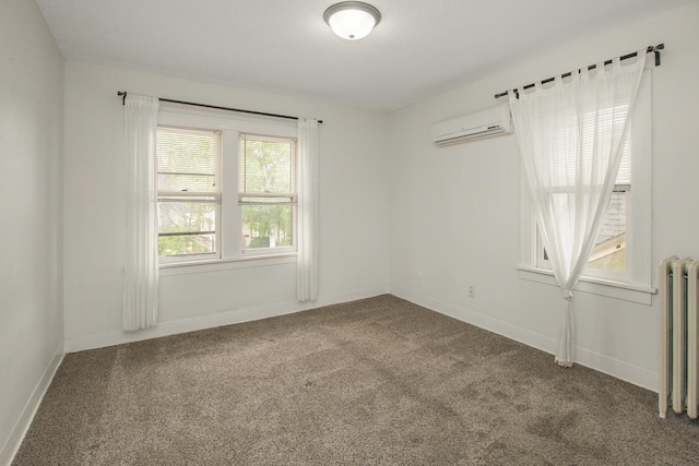 139 Annapolis St E, Saint Paul, MN 55118 - unfurnished room with radiator, a wall mounted air conditioner, carpet floors, and baseboards