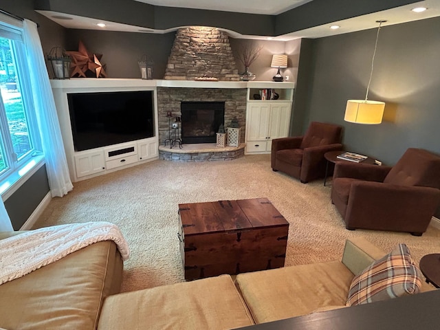 2907 Cougar Path NW, Prior Lake, MN 55372 - carpeted living area featuring built in shelves, recessed lighting, and a fireplace