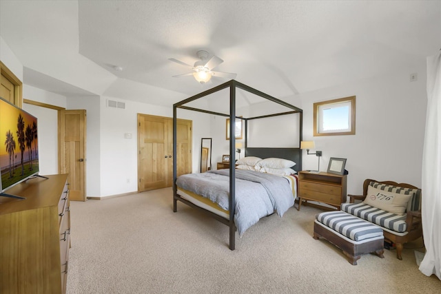 2907 Cougar Path NW, Prior Lake, MN 55372 - bedroom featuring light colored carpet, baseboards, ceiling fan, and lofted ceiling
