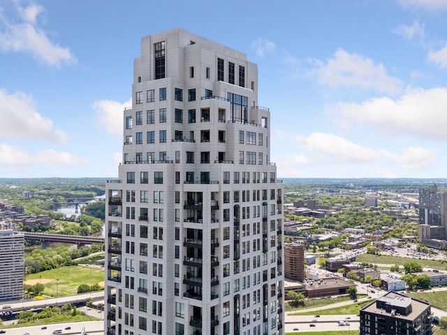 1111 River Pkwy Unit 33A, Minneapolis, MN 55415 - view of building exterior with a city view and central AC unit