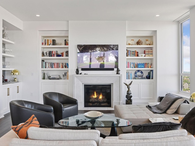 1111 River Pkwy Unit 33A, Minneapolis, MN 55415 - living room featuring built in features, a glass covered fireplace, wood finished floors, and recessed lighting