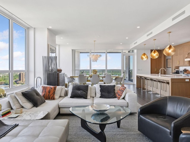 1111 River Pkwy Unit 33A, Minneapolis, MN 55415 - living area featuring dark wood-style flooring and recessed lighting