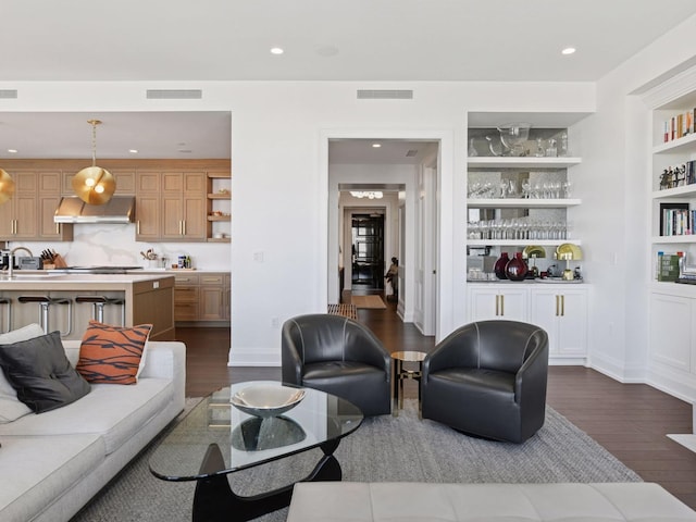 1111 River Pkwy Unit 33A, Minneapolis, MN 55415 - living area with dark wood finished floors, recessed lighting, and baseboards
