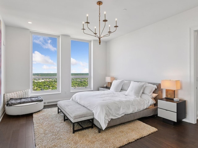 1111 River Pkwy Unit 33A, Minneapolis, MN 55415 - bedroom with a chandelier, dark wood-style floors, baseboards, and recessed lighting