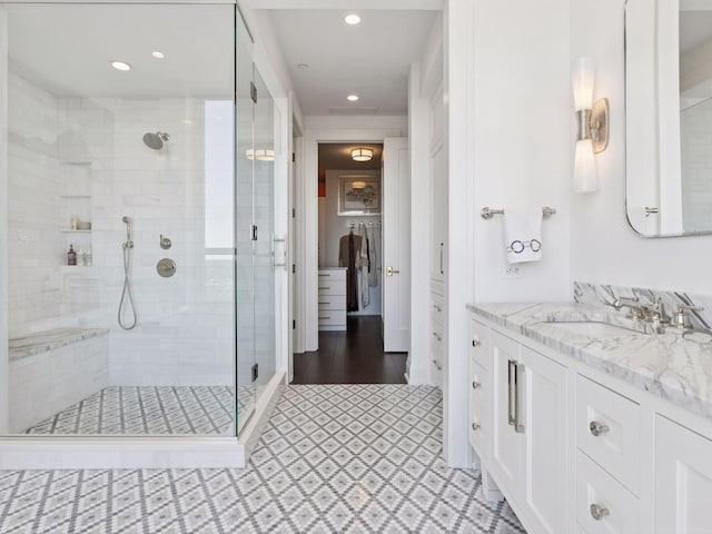 1111 River Pkwy Unit 33A, Minneapolis, MN 55415 - full bathroom featuring a shower stall, vanity, tile patterned floors, and recessed lighting