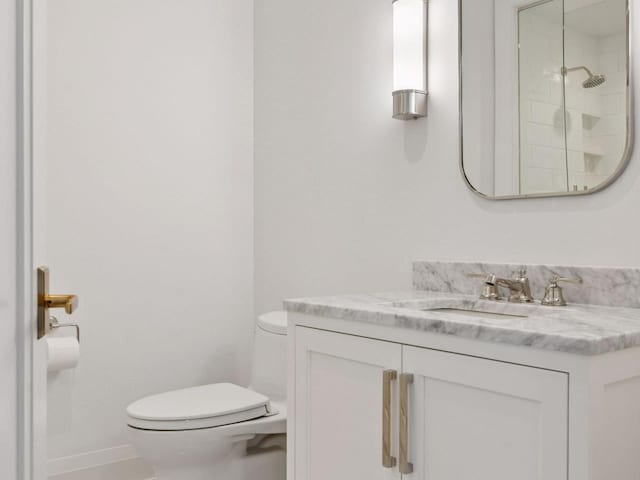 1111 River Pkwy Unit 33A, Minneapolis, MN 55415 - full bath featuring toilet, vanity, and a shower