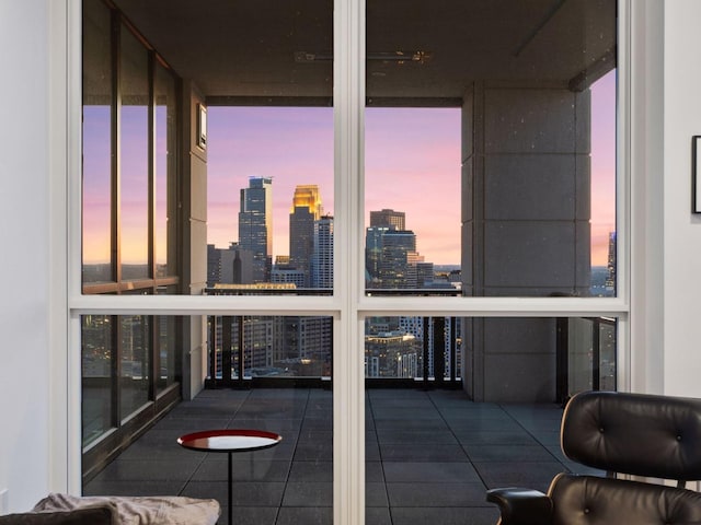 1111 River Pkwy Unit 33A, Minneapolis, MN 55415 - sunroom / solarium with a view of skyline