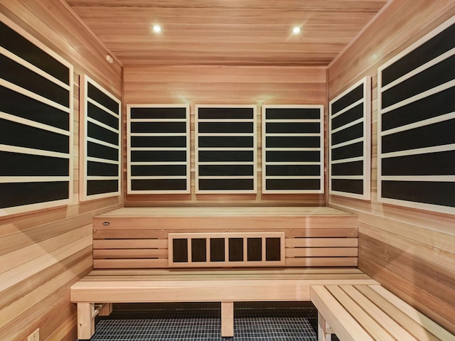 1111 River Pkwy Unit 33A, Minneapolis, MN 55415 - sauna with wooden ceiling, wood walls, and recessed lighting