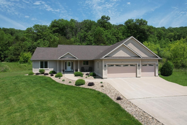 9484 Branch Rd SE, Chatfield, MN 55923 - single story home featuring covered porch, an attached garage, concrete driveway, and a front yard