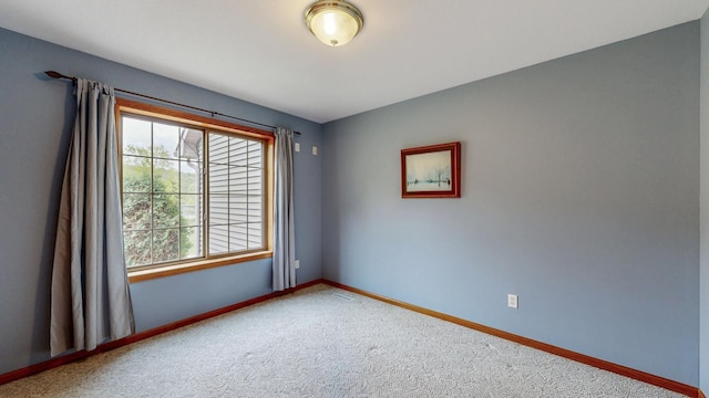 9484 Branch Rd SE, Chatfield, MN 55923 - unfurnished room with baseboards and carpet flooring
