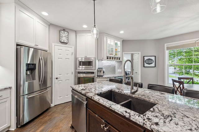 18764 Farmstead Cir, Eden Prairie, MN 55347 - kitchen featuring stainless steel appliances, a sink, dark wood-style floors, recessed lighting, and white cabinetry