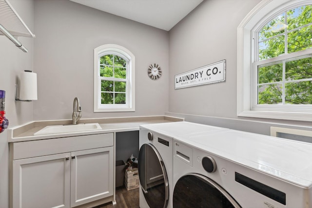 18764 Farmstead Cir, Eden Prairie, MN 55347 - laundry area featuring washer and clothes dryer, cabinet space, and dark wood finished floors