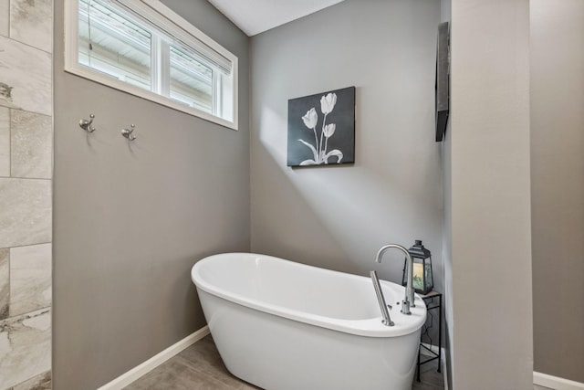 18764 Farmstead Cir, Eden Prairie, MN 55347 - full bath with a soaking tub and baseboards