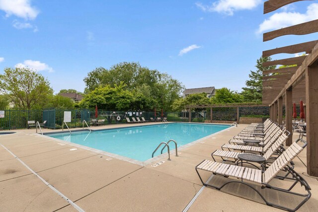 18764 Farmstead Cir, Eden Prairie, MN 55347 - community pool featuring a patio