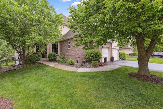 18764 Farmstead Cir, Eden Prairie, MN 55347 - view of property hidden behind natural elements featuring driveway, brick siding, a garage, a front yard, and a shingled roof