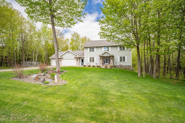4975 Maribe Dr, Hermantown, MN 55811 - colonial house featuring a front yard and driveway