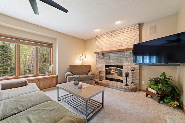 4975 Maribe Dr, Hermantown, MN 55811 - carpeted living room featuring a ceiling fan, a textured ceiling, a brick fireplace, recessed lighting, and baseboards