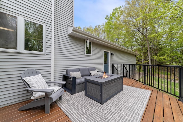 4975 Maribe Dr, Hermantown, MN 55811 - wooden terrace featuring an outdoor living space with a fire pit