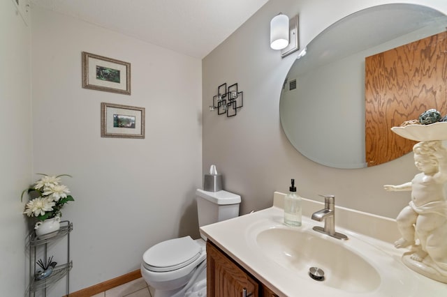 4975 Maribe Dr, Hermantown, MN 55811 - bathroom featuring toilet, vanity, and tile patterned flooring