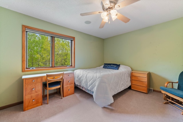 4975 Maribe Dr, Hermantown, MN 55811 - bedroom with light carpet, baseboards, and a ceiling fan