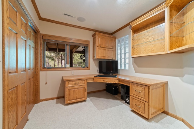 4975 Maribe Dr, Hermantown, MN 55811 - office area featuring built in study area, ornamental molding, baseboards, and light carpet
