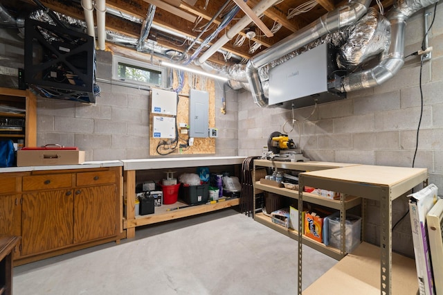4975 Maribe Dr, Hermantown, MN 55811 - basement featuring electric panel and a workshop area