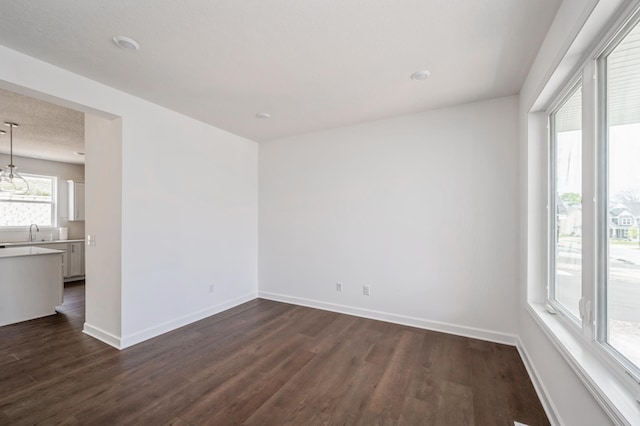 7353 Auburn Ln, Inver Grove Heights, MN 55077 - empty room featuring dark wood-style flooring and baseboards