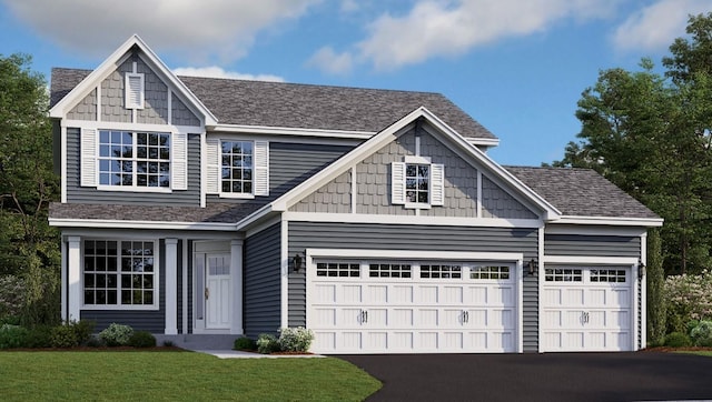 7353 Auburn Ln, Inver Grove Heights, MN 55077 - view of front facade with asphalt driveway, a garage, a front yard, and a shingled roof