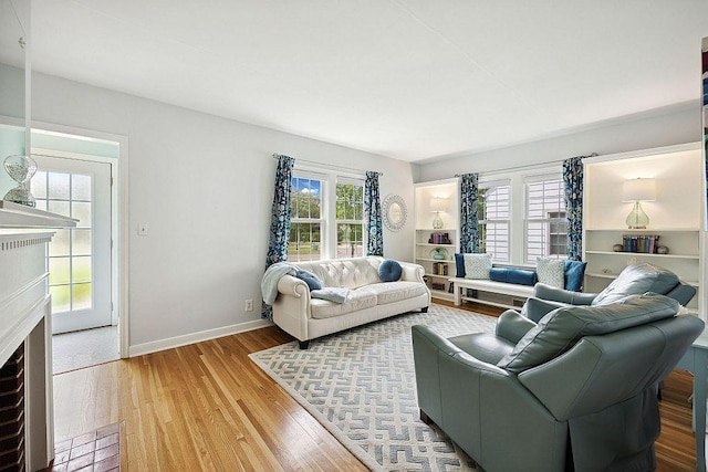 living room with wood finished floors and baseboards
