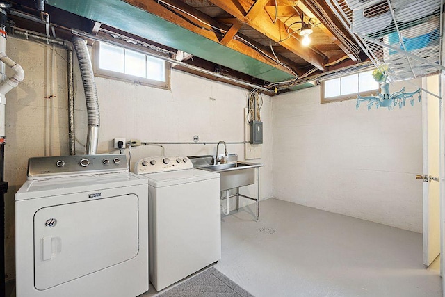 laundry area featuring washer and dryer and electric panel