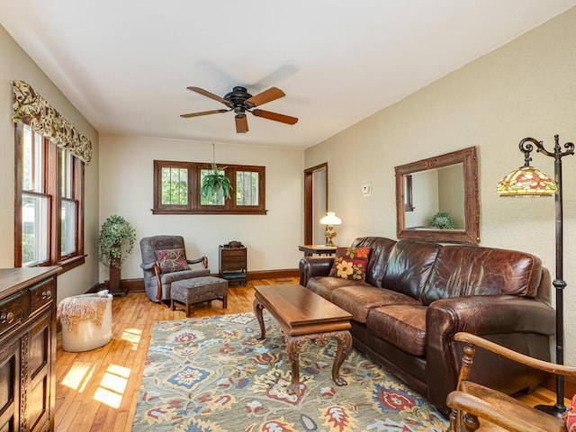 15210 Mckenzie Blvd, Minnetonka, MN 55345 - living room with ceiling fan, light wood-style flooring, and baseboards