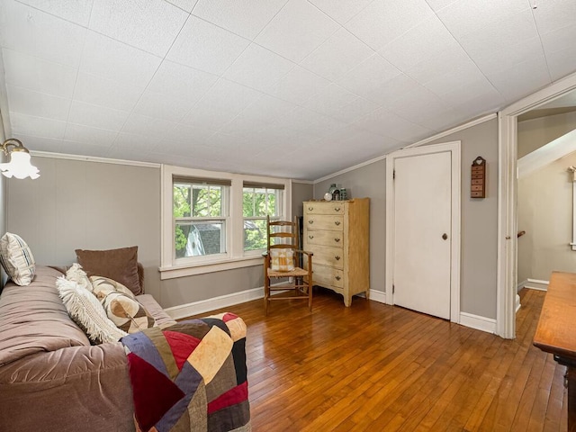 15210 Mckenzie Blvd, Minnetonka, MN 55345 - living area with hardwood / wood-style flooring, lofted ceiling, crown molding, and baseboards