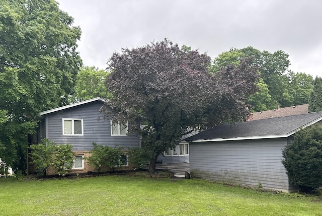6880 Sunnyslope Dr, Maple Grove, MN 55311 - rear view of property with a yard and brick siding