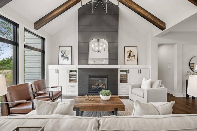 202 176th Ln NE, Ham Lake, MN 55304 - living room with wood finished floors, baseboards, beamed ceiling, high vaulted ceiling, and a chandelier