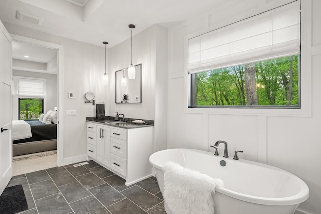 202 176th Ln NE, Ham Lake, MN 55304 - ensuite bathroom with vanity and a freestanding tub