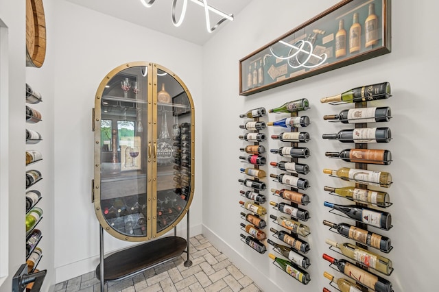 202 176th Ln NE, Ham Lake, MN 55304 - wine room featuring brick patterned floors and baseboards