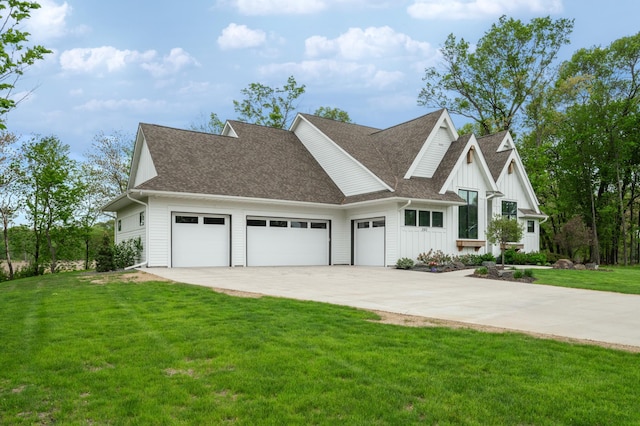 202 176th Ln NE, Ham Lake, MN 55304 - modern inspired farmhouse with an attached garage, board and batten siding, driveway, a shingled roof, and a front lawn
