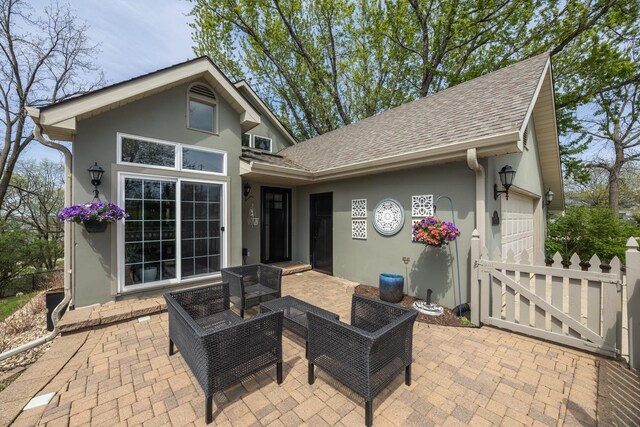 2513 Aspen Ln SW, Rochester, MN 55902 - view of patio with an attached garage and fence