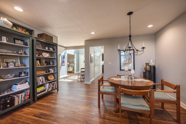 2513 Aspen Ln SW, Rochester, MN 55902 - dining space featuring dark wood-style floors, a chandelier, baseboards, and recessed lighting