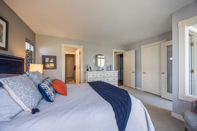 2513 Aspen Ln SW, Rochester, MN 55902 - bedroom featuring light carpet and baseboards